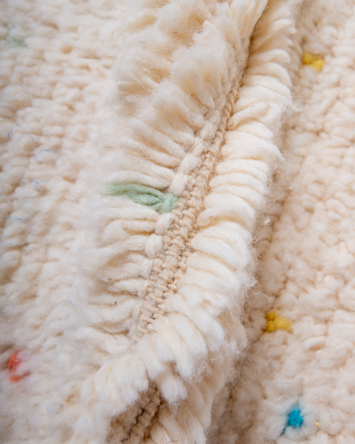 Modern, designer, handcrafted Berber rug from Morocco. Beniourain carpet with beautiful colours and patterns and fluffy wool texture.
